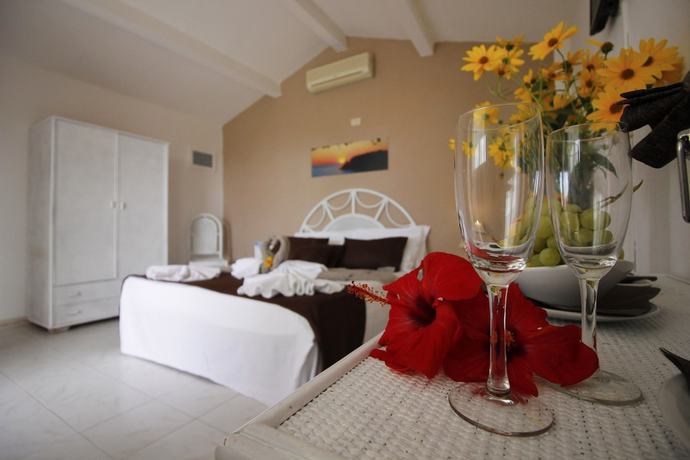 Imagen de la habitación del Hotel Villaggio Baia D'ercole. Foto 3