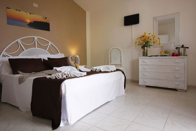 Imagen de la habitación del Hotel Villaggio Baia D'ercole. Foto 6