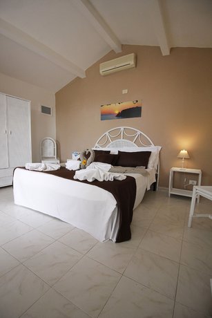 Imagen de la habitación del Hotel Villaggio Baia D'ercole. Foto 8
