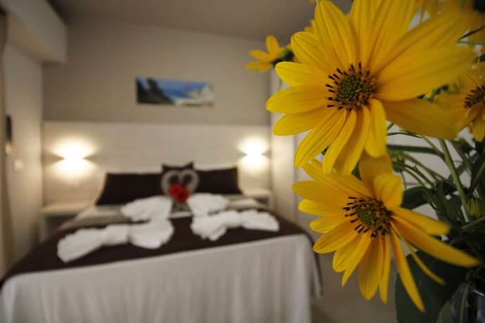 Imagen de la habitación del Hotel Villaggio Baia D'ercole. Foto 11