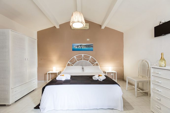 Imagen de la habitación del Hotel Villaggio Baia D'ercole. Foto 13