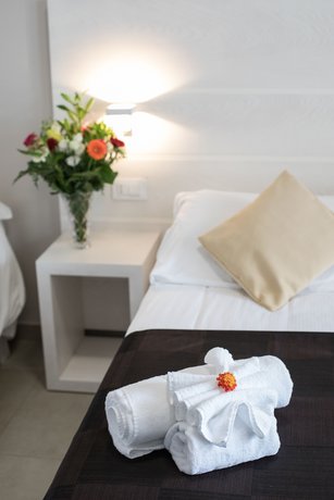 Imagen de la habitación del Hotel Villaggio Baia D'ercole. Foto 16