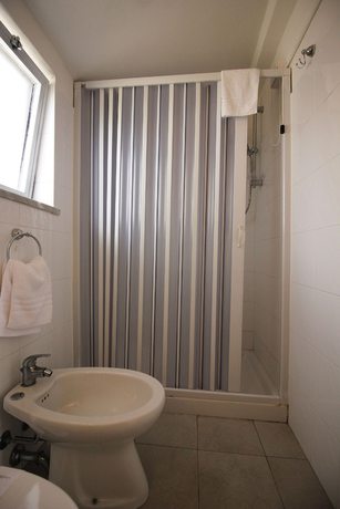 Imagen de la habitación del Hotel Villaggio Baia D'ercole. Foto 17