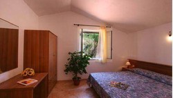 Imagen de la habitación del Hotel Villaggio Baia del Godano. Foto 15