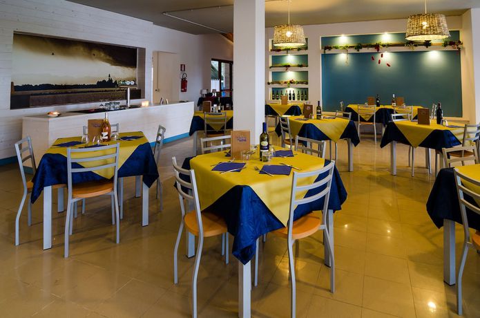 Imagen del bar/restaurante del Hotel Villaggio Cà Laguna. Foto 4
