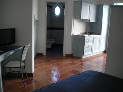 Imagen de la habitación del Hotel Villaggio Cala La Luna. Foto 3