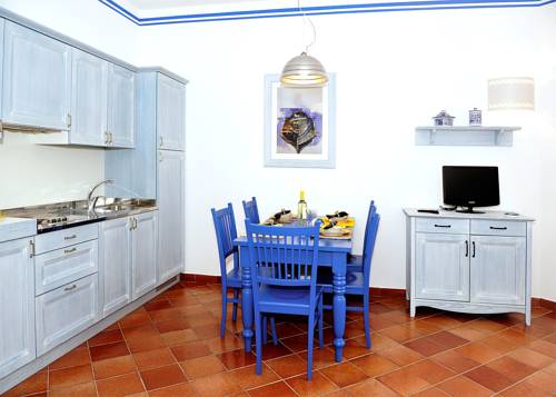 Imagen de la habitación del Hotel Villaggio Cala La Luna. Foto 5