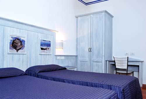 Imagen de la habitación del Hotel Villaggio Cala La Luna. Foto 6