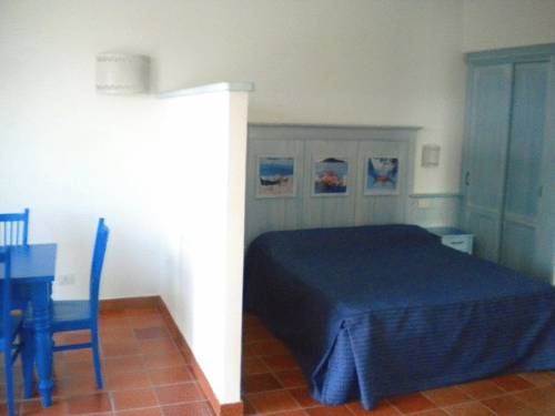 Imagen de la habitación del Hotel Villaggio Cala La Luna. Foto 10