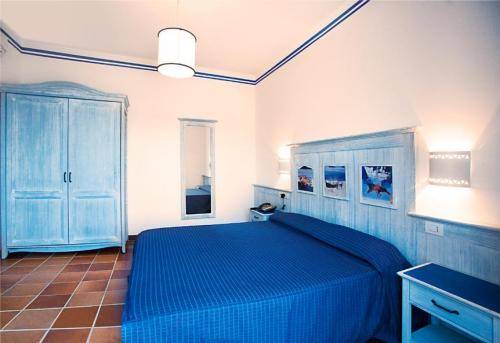 Imagen de la habitación del Hotel Villaggio Cala La Luna. Foto 14