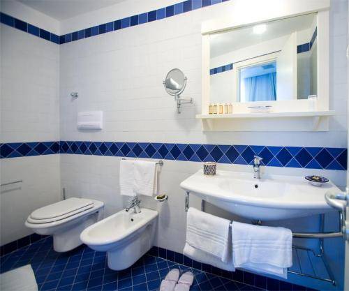 Imagen de la habitación del Hotel Villaggio Cala La Luna. Foto 16