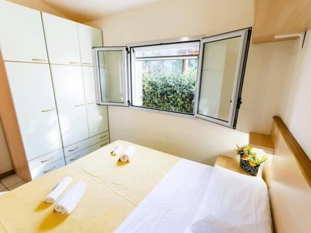 Imagen de la habitación del Hotel Villaggio Camping Duca Amedeo. Foto 6