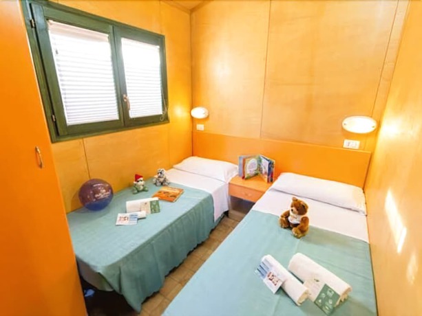 Imagen de la habitación del Hotel Villaggio Camping Duca Amedeo. Foto 7