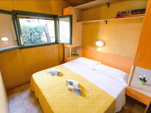 Imagen de la habitación del Hotel Villaggio Camping Duca Amedeo. Foto 11