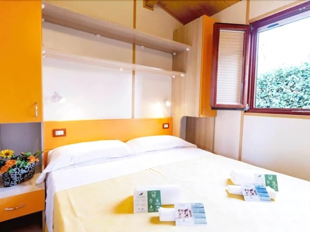 Imagen de la habitación del Hotel Villaggio Camping Duca Amedeo. Foto 14