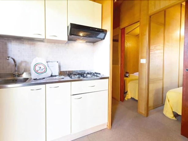 Imagen de la habitación del Hotel Villaggio Camping Duca Amedeo. Foto 18