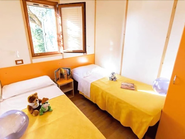 Imagen de la habitación del Hotel Villaggio Camping Duca Amedeo. Foto 19