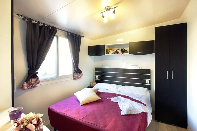 Imagen de la habitación del Hotel Villaggio Camping Europa. Foto 4