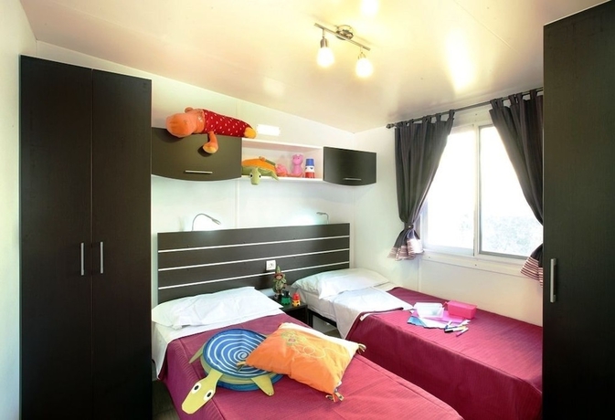 Imagen de la habitación del Hotel Villaggio Camping Europa. Foto 5
