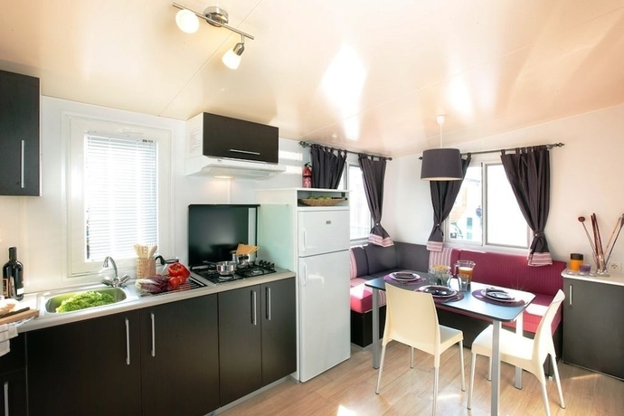 Imagen de la habitación del Hotel Villaggio Camping Europa. Foto 10