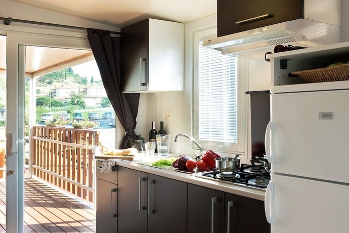 Imagen de la habitación del Hotel Villaggio Camping Europa. Foto 11