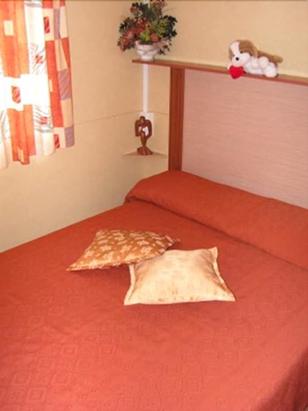 Imagen de la habitación del Hotel Villaggio Camping Orchidea. Foto 5