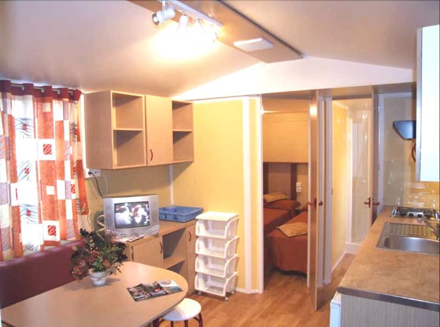 Imagen de la habitación del Hotel Villaggio Camping Orchidea. Foto 6