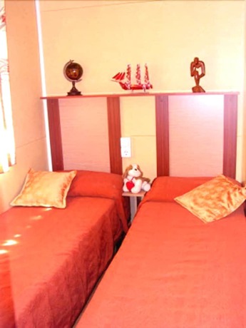 Imagen de la habitación del Hotel Villaggio Camping Orchidea. Foto 7
