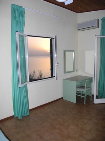 Imagen de la habitación del Hotel Villaggio Capo Alaua. Foto 12