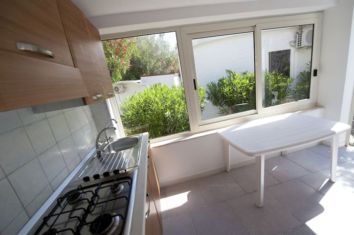 Imagen de la habitación del Hotel Villaggio Capo Vieste Camping. Foto 6