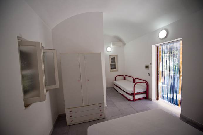 Imagen de la habitación del Hotel Villaggio Capo Vieste Camping. Foto 11
