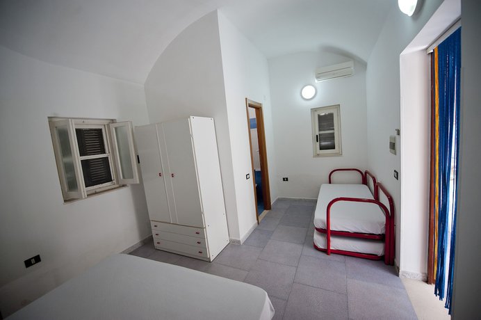 Imagen de la habitación del Hotel Villaggio Capo Vieste Camping. Foto 14