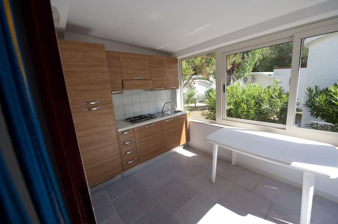 Imagen de la habitación del Hotel Villaggio Capo Vieste Camping. Foto 16