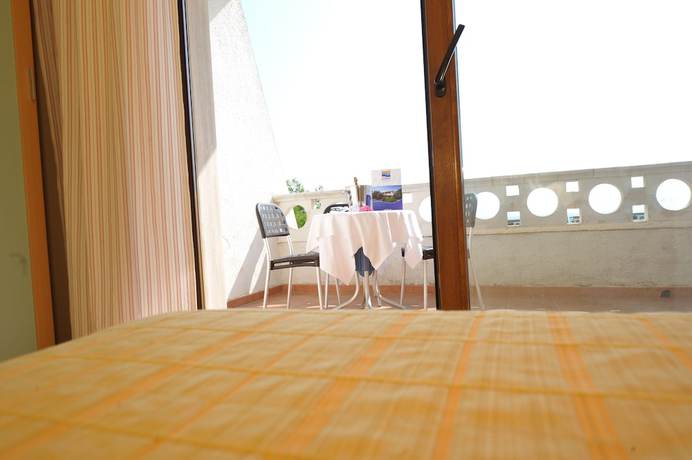 Imagen de la habitación del Hotel Villaggio Club Eden. Foto 6