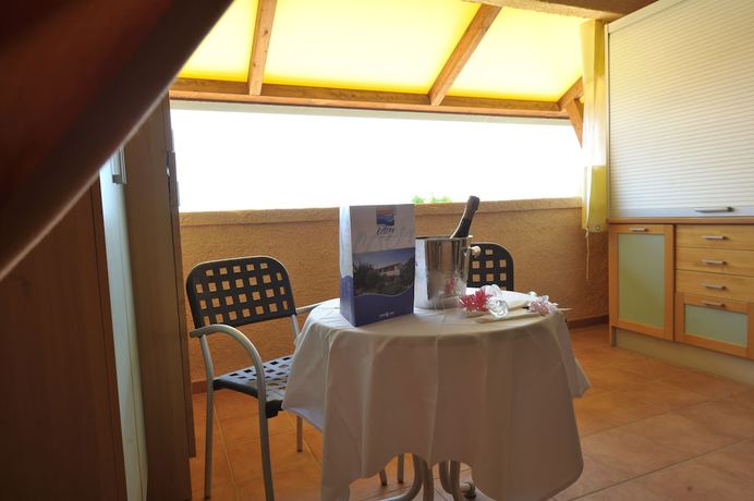 Imagen de la habitación del Hotel Villaggio Club Eden. Foto 13