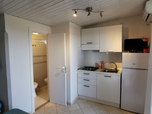 Imagen de la habitación del Hotel Villaggio Gabbiano Beach. Foto 15
