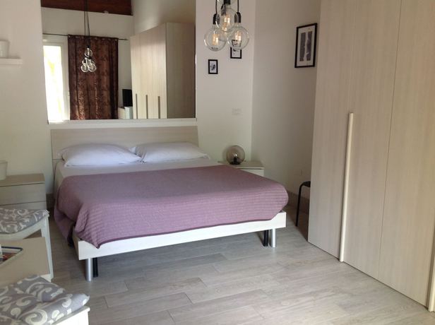Imagen de la habitación del Hotel Villaggio Grande Italia. Foto 4