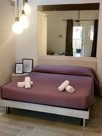 Imagen de la habitación del Hotel Villaggio Grande Italia. Foto 9