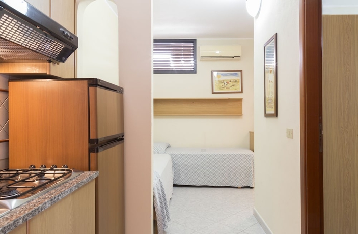Imagen de la habitación del Hotel Villaggio Il Gabbiano. Foto 6