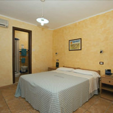 Imagen de la habitación del Hotel Villaggio Il Gabbiano. Foto 15