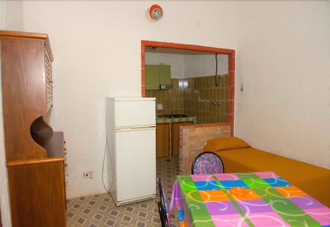 Imagen de la habitación del Hotel Villaggio Irene. Foto 12