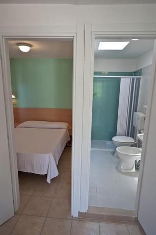 Imagen de la habitación del Hotel Villaggio Le Diomedee. Foto 4