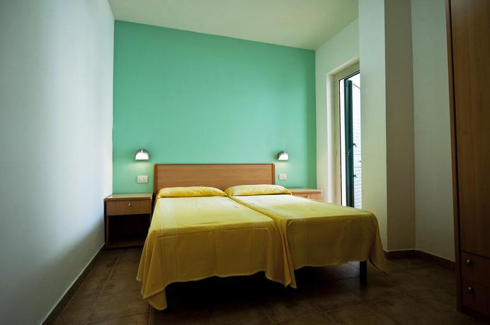 Imagen de la habitación del Hotel Villaggio Le Diomedee. Foto 6