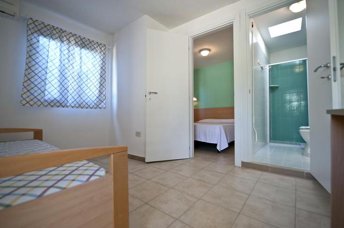Imagen de la habitación del Hotel Villaggio Le Diomedee. Foto 7