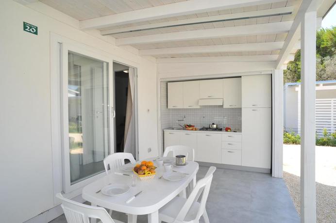 Imagen de la habitación del Hotel Villaggio Le Diomedee. Foto 8