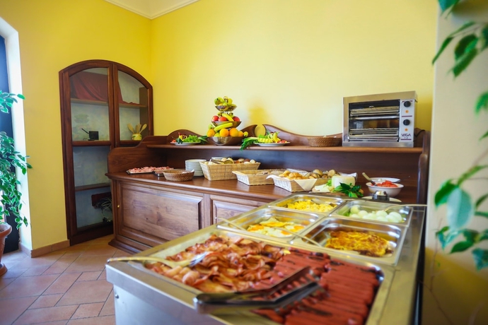 Imagen del bar/restaurante del Hotel Villaggio Lido San Giuseppe. Foto 5