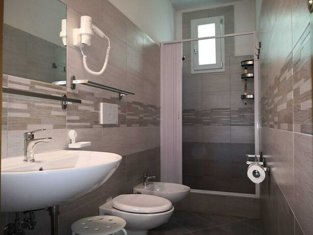 Imagen de la habitación del Hotel Villaggio Mare Blu. Foto 26