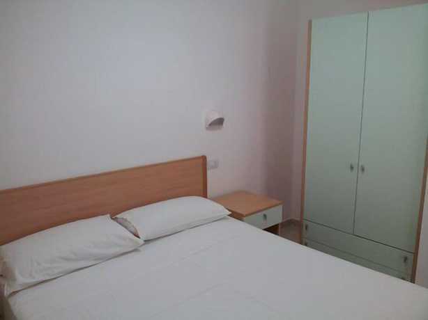 Imagen de la habitación del Hotel Villaggio Piano Grande. Foto 13