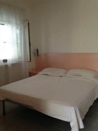 Imagen de la habitación del Hotel Villaggio Piano Grande. Foto 16