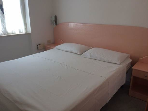 Imagen de la habitación del Hotel Villaggio Piano Grande. Foto 18